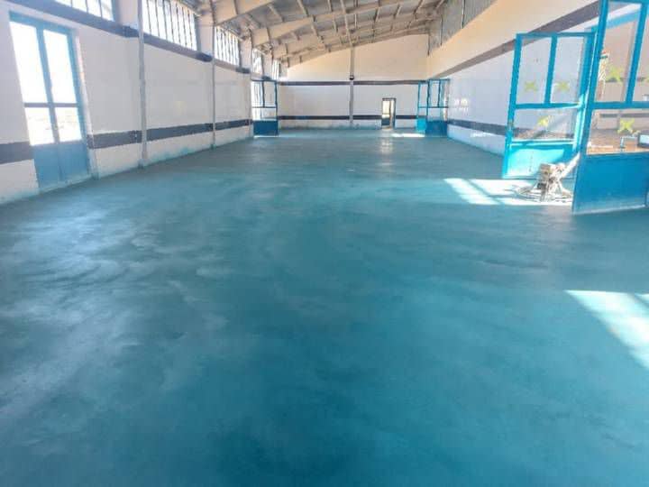 اجرای کف سازی بتن صنعتی با ماله پروانه‌ی مختارزاده در قزوین